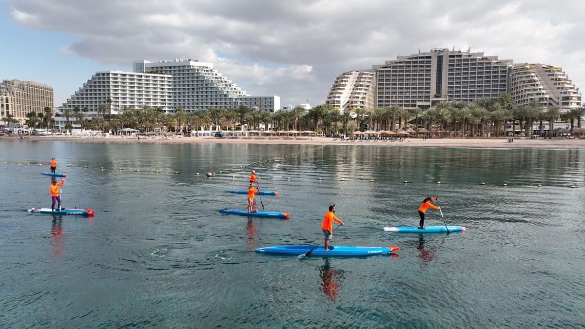 Sea and hotel in Eilat with people on the SAP
