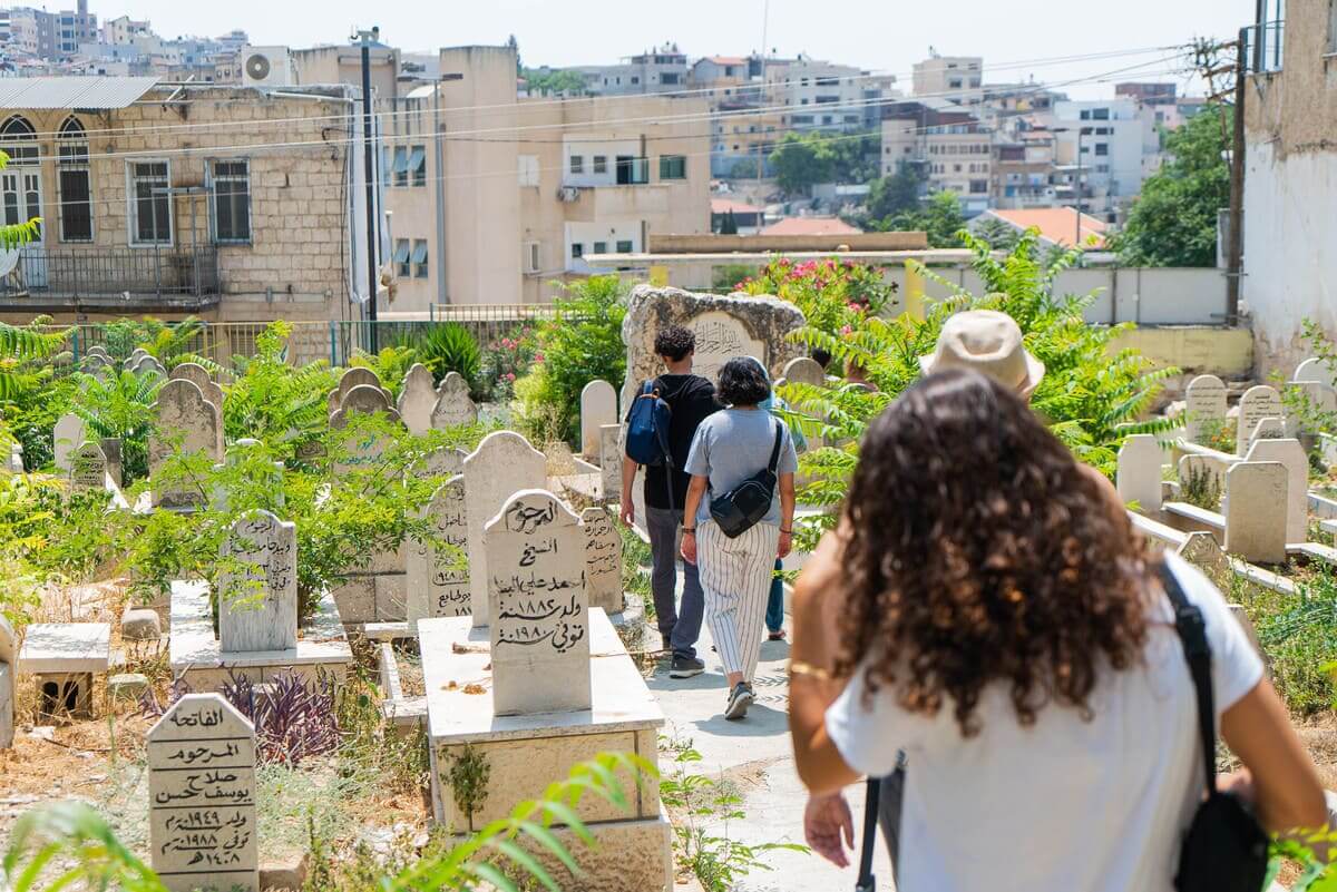 People on a tour of a cemetery in Nazareth